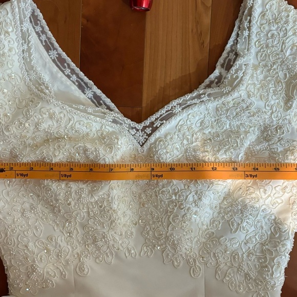 Off white bridal gown, never altered with matching tiara and matching veil. - Picture 7 of 12